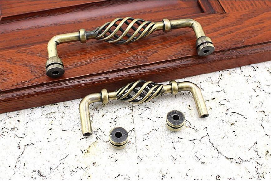 Provincial kitchen cabinet handles twist antique brass - Image 2